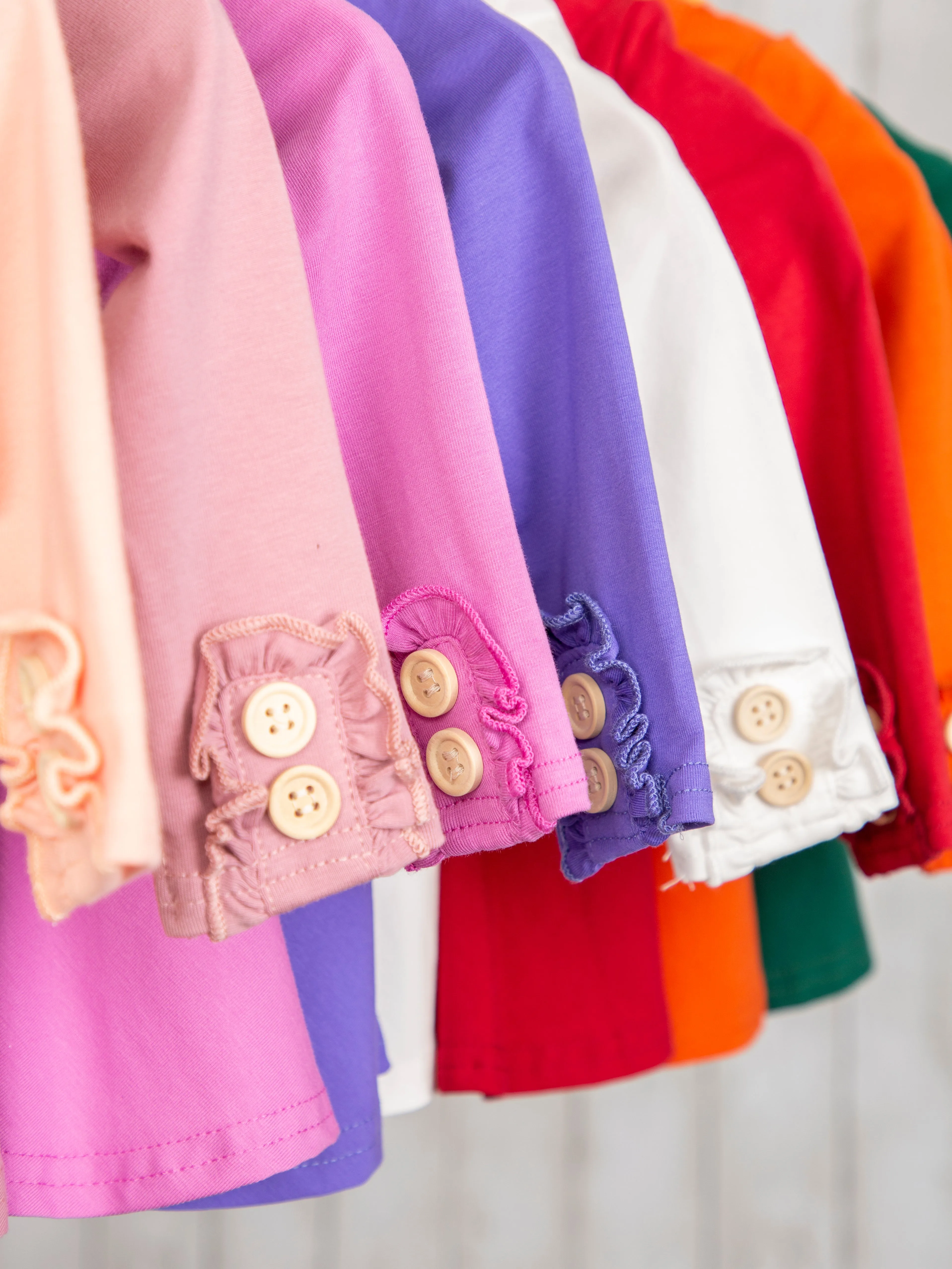 Cotton Bow Back Button Ruffle Sleeve Peplum Top - Bright Colors