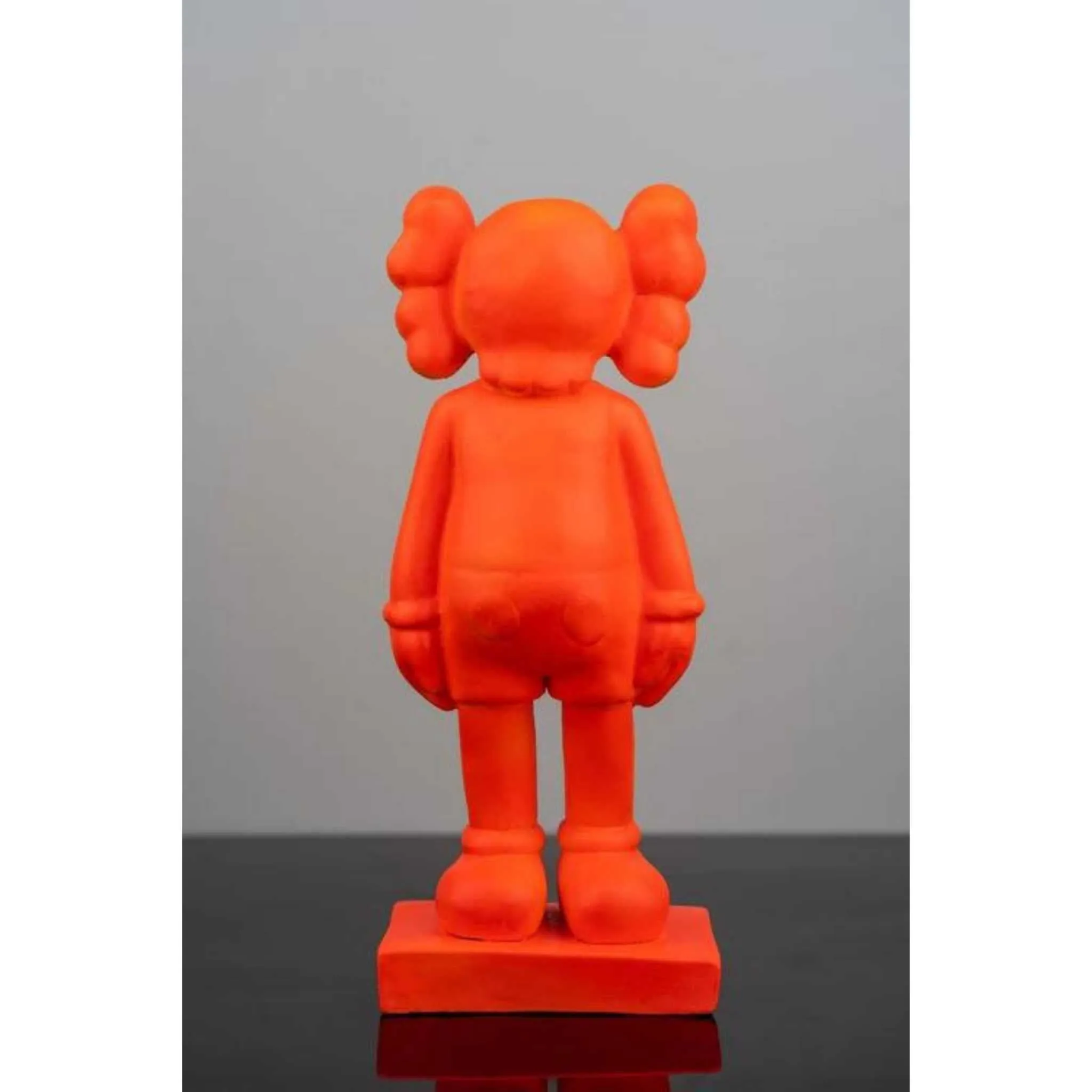 Fiery Orange: The KAWS Figure